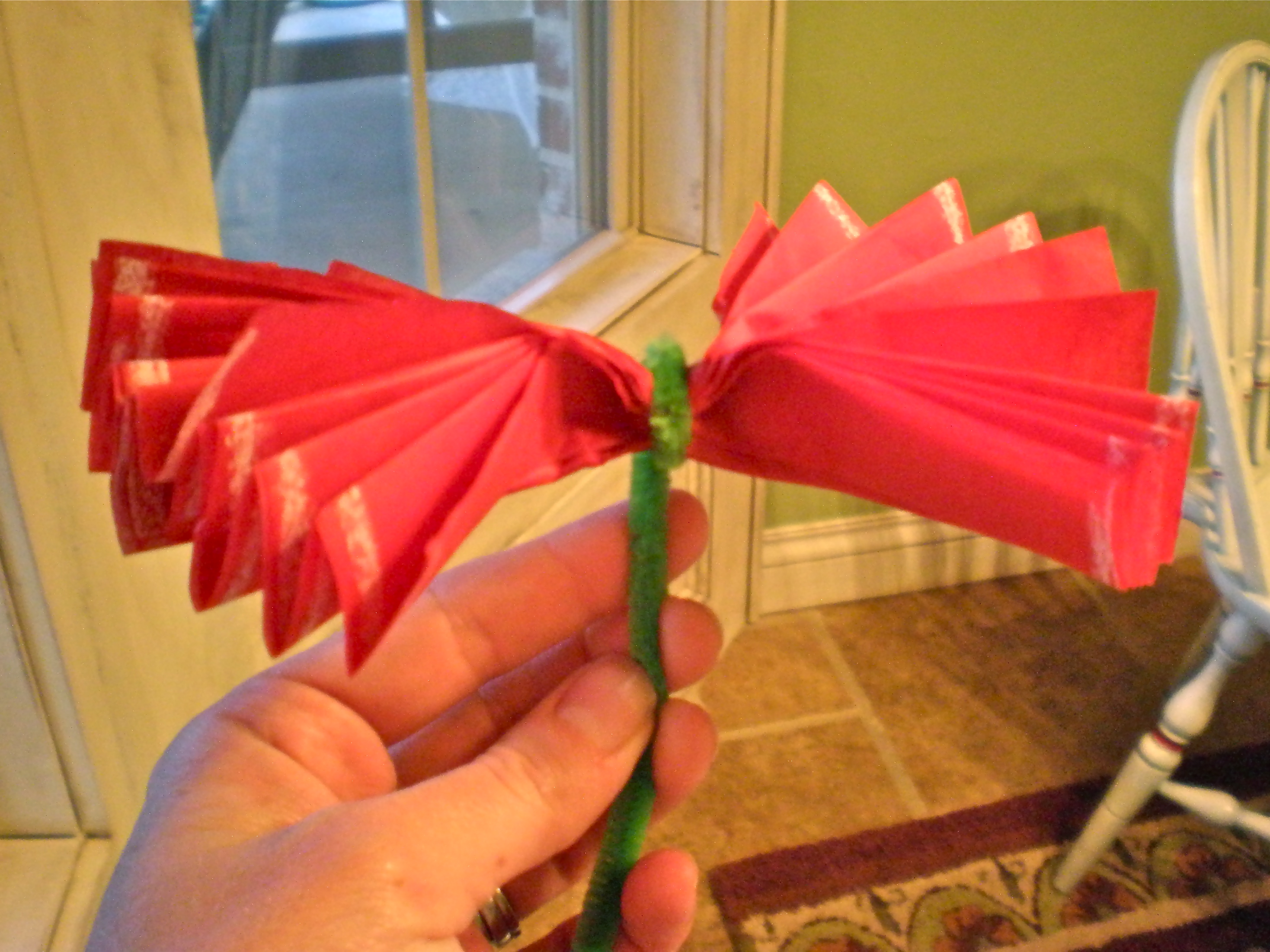 Now its time to fan out the flower Pull and twist the tissue apart to